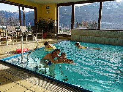 Hundehotel - Pools: Außenpool beheizt - Österreich - nawu_apartments_Familienurlaub_Schwimmschule_Schwimmen_lernen_Schwimmkurs - nawu apartments