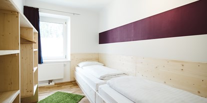 Hundehotel - Unterkunftsart: Appartement - Steiermark - Schlafzimmer mit Einzelbetten - Erzberg Alpin Resort