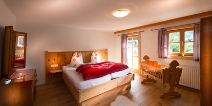 Hundehotel - Unterkunftsart: Chalet - Doppelzimmer mit Balkon im Birnbaum Chalet Frauenkogel - Birnbaum Chalets