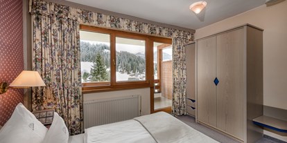 Hundehotel - Obertauern - Elternschlafzimmer in der Familien-Luxussuite "Max & Moritz" - Hotel St. Oswald