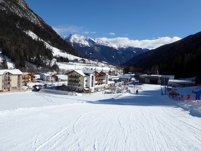 Hundehotel - Dorf Tirol - Hotel Winter, direkt an der Skipiste - Hotel Bergkristall