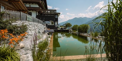 Hundehotel - Pools: Schwimmteich - Österreich - Alpin Beach Club - Hotel BergBaur 