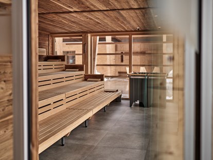 Hundehotel - Wellnessbereich - Panorama-Sauna mit täglichen Aufgüssen - HUBERTUS MOUNTAIN REFUGIO ALLGÄU
