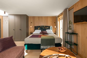 Urlaub-mit-Hund: Zimmer im alpinen Stil - Hotel Schranz 