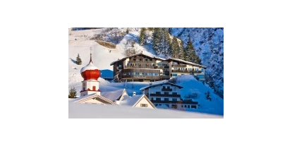 Hundehotel - Sauna - Davos Dorf - Hubertushof Wohlfühlhotel im Winter - Hubertushof Wohlfühlhotel