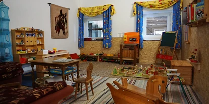 Hundehotel - Unterkunftsart: Appartement - Kirchanschöring - Spielzimmer mit Kleinkinderspielecke - Seimehof