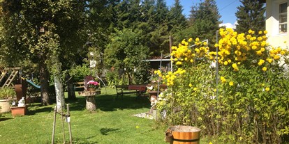 Hundehotel - Unterkunftsart: Pension - Rauth (Nesselwängle) - unser Garten - Haus Alpengruss