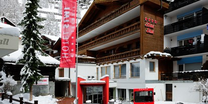 Hundehotel - Klassifizierung: 4 Sterne - Schweiz - Eingang Winter - Hotel Simi