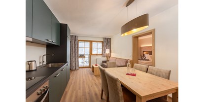 Hundehotel - Unterkunftsart: Hotel - PLZ 5090 (Österreich) - Hotelappartement Sonnkogel
komfortables wohnen mit 2 Schlafzimmern und Wohnraum mit Küchenzeile - Berghotel Jaga Alm 