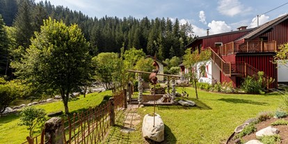 Hundehotel - Unterkunftsart: Chalet - Österreich - Smileys Fuss Chalet Lieserrauschen Gartenbereich - Smileys Fluss Chalet