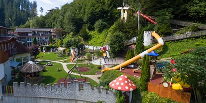 Hundehotel - Mikrowelle - Österreich - Smileys Kinderhotel Spielplatz  - Smileys Fluss Chalet