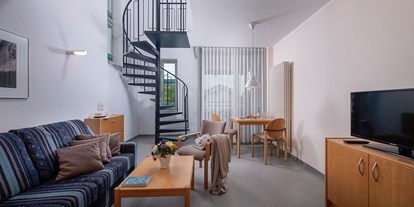Hundehotel - Klimaanlage - Rügen - Gemütlicher Wohnbereich der Ferienwohnung "Kreideküste" für 4-5 Personen - Rügener Ferienhäuser am Hochufer