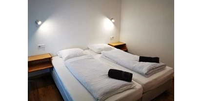 Hundehotel - Unterkunftsart: Hotel - Spießberg - Schlafzimmer - Vianova Lodges & Geinberg Suites