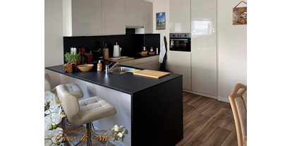 Hundehotel - Waschmaschine - geräumige, voll ausgestattete und moderne Küche - spacious, fully equipped and state-of-the art kitchen - Coco de Mer