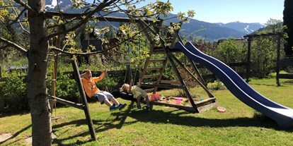 Hundehotel - Badewanne - Österreich - Garten Spielturm mit Sandkiste - Appartement Mama
