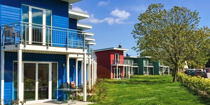 Hundehotel - in einer Ferienanlage/Wohnanlage - Deutschland - Premiumhaus (Blau) Aussenansicht  - Premiumhaus im Dampland
