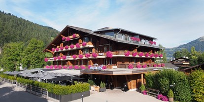 Hundehotel - Hundewiese: nicht eingezäunt - Hotel im Sommer - Arc-en-ciel Gstaad