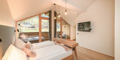 Hundehotel - WLAN - PLZ 5751 (Österreich) - Helle Zimmer in Naturmaterialien wie Holz und Loden lassen in Punkto Komfort keine Wünsche offen. - Hotel Bergzeit
