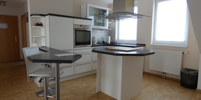 Hundehotel - WLAN - Nordseeküste - Beispielfoto für Küche im Appartement - NordseeResort Hotel&Suite Arche Noah