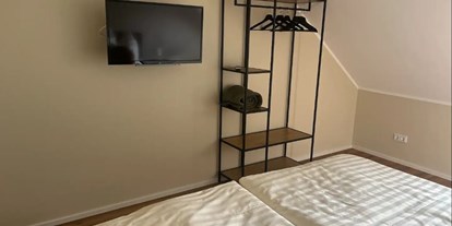 Hundehotel - Internet - Die Wohnung verfügt über 4 Schlafzimmer jeweils mit einem Doppelbett. - Feriendomizil Im Saarschleifenland  (Camille Ollinger )