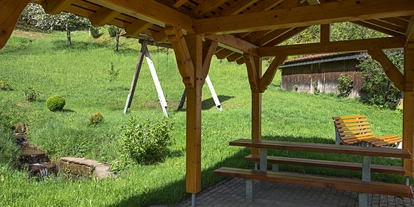 Hundehotel - Umgebungsschwerpunkt: am Land - Bühl (Rastatt) - Sitzecke im Garten - Ferienwohnung Stinneshof