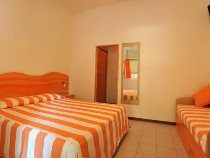 Hundehotel - Trink-/Fressnapf: an der Rezeption - Ferrara - Gästezimmer - Feriendorf Spiaggia Romea