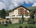 Urlaub-mit-Hund: Hotelansicht - Hotel Bergfrieden Fiss in Tirol