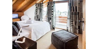 Hundehotel - Ladis - Schlafzimmer mit Balkon und Bergblick - Das BERGESGRÜN