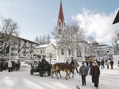 Hundehotel - Ladis - Fußgängerzone Seefeld in Tirol - alpinen Lifestyle im Sommer wie im Winter genießen - Inntalerhof - DAS Panoramahotel