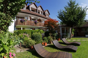 Urlaub-mit-Hund: Garten im Bodensee Hotel Storchen - Bodensee Hotel Storchen 