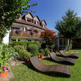 Urlaub-mit-Hund: Garten im Bodensee Hotel Storchen - Bodensee Hotel Storchen 