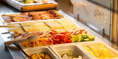 Hundehotel - Unterkunftsart: Hotel - Dackenheim - Starten Sie mit einem ausgewogenen und leckeren Frühstück in den Tag - Hotel "Die kleine Blume"