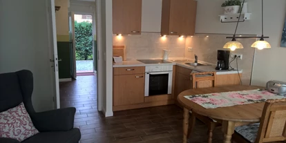 Hundehotel - Doggies: 3 Doggies - Bastorf - Wohnzimmer - Strandhaus Bello Cane