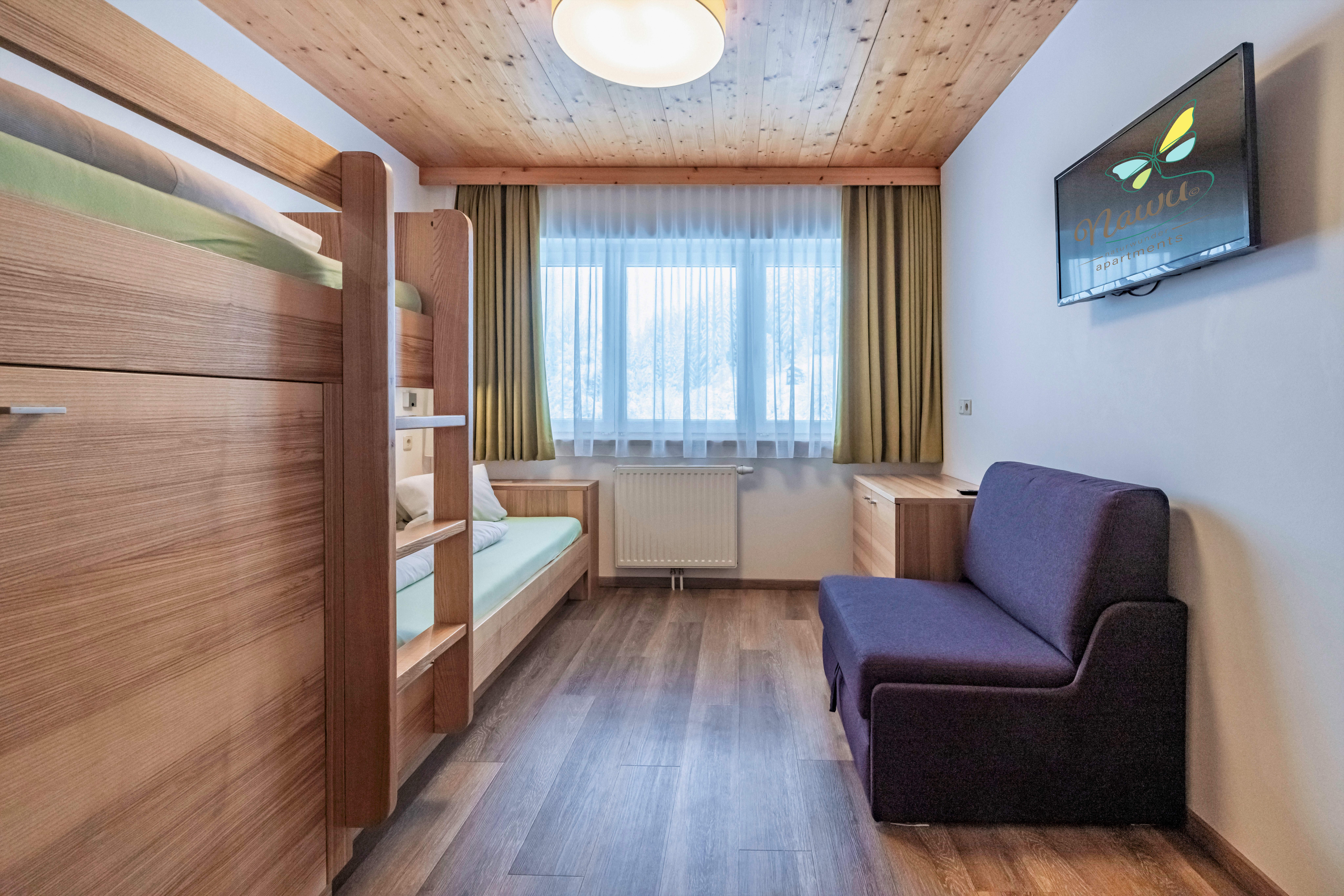 Urlaub-mit-Hund: nawu_apartments_Apartment Kleopatrafalter_Kinderzimmer - nawu apartments & Restaurant