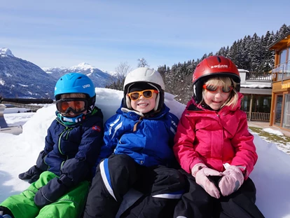 Hundehotel - Doggies: 3 Doggies - nawu_apartments_Rodeln_Familienurlaub_Winterurlaub_Nassfeld - nawu apartments & Restaurant