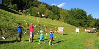 Hundehotel - Doggies: 3 Doggies - Bogenschießen - Hotel Glocknerhof