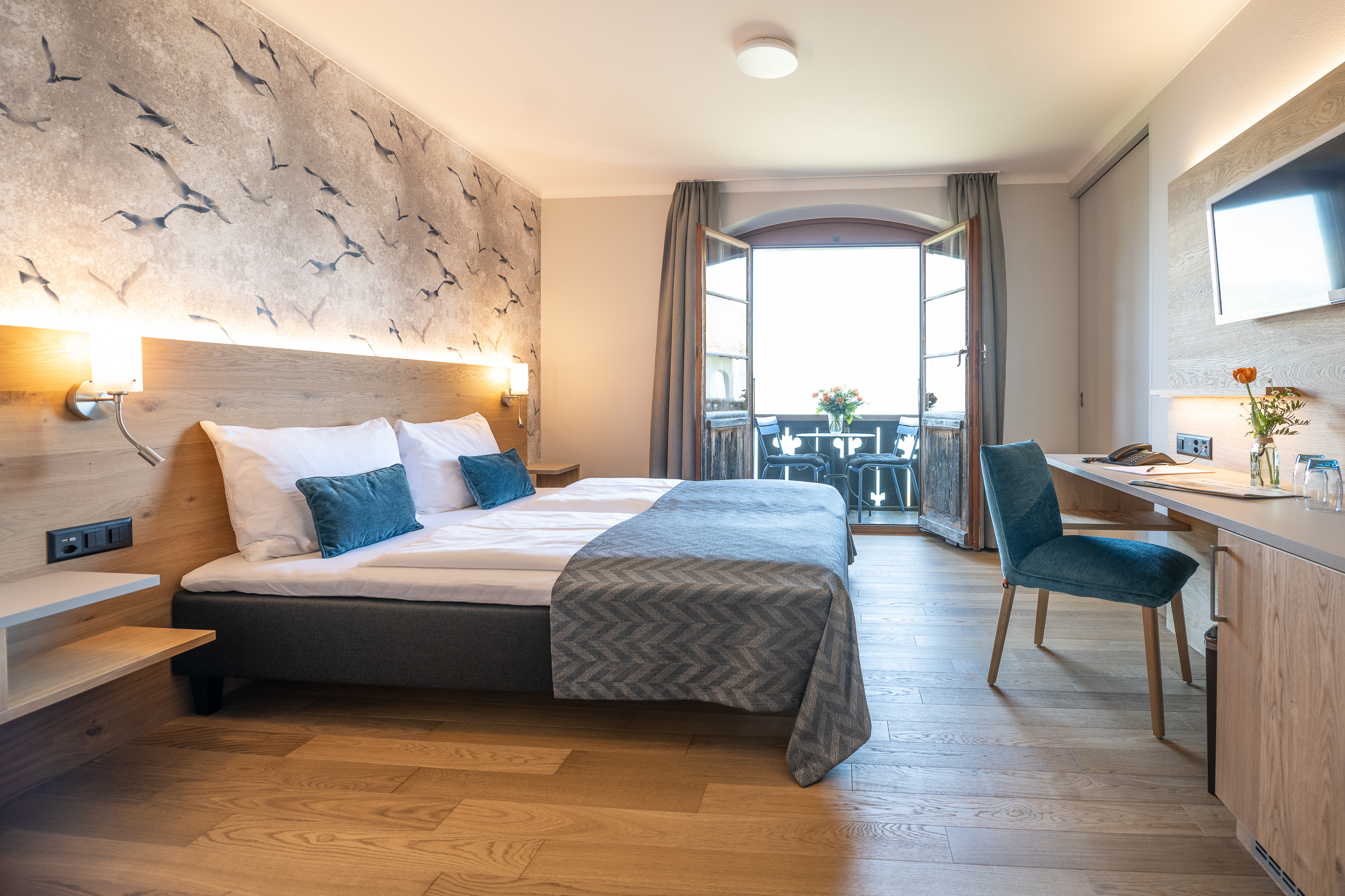 See- und Seminarhotel FloraAlpina Zimmerkategorien Doppelzimmer mit Seeblick und Balkon