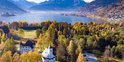 Hundehotel - Dogsitting - Flachau - Schloss Prielau mit Dreifaltigkeitskirche zu Prielau am Zeller See  - Hotel Schloss Prielau