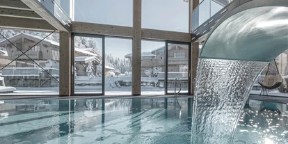 Hundehotel - Bad Leonfelden - INNs HOLZ Natur- & Vitalhotel****s Ausblick vom Indoorpool im Winter - INNs HOLZ Natur- & Vitalhotel****s