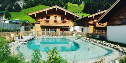 Hundehotel - in einer Ferienanlage/Wohnanlage - Großarl - Birnbaum Chalets mit Naturbadesee - Birnbaum Chalets