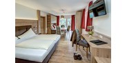 Hundehotel - Salzburg - Modern und im Landhausstil eingerichtete Doppel / Familienzimmer
laden zum ausschlafen ein - Berghotel Jaga Alm 