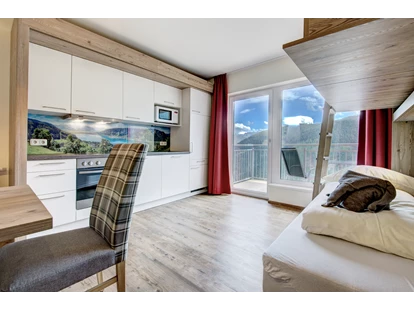 Hundehotel - Pools: Schwimmteich - Familien-Studio "Tauernblick" - Berghotel Jaga Alm