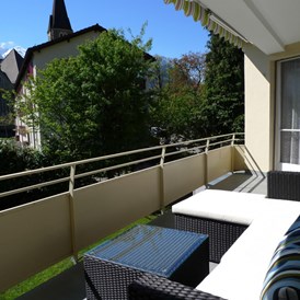 Ferienhaus mit Hund: Gedeckter Balkon (Blick nach Südwest) - alscher's holiday home