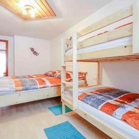 Ferienhaus mit Hund: 4-Zimmer mit Doppelbett und Stockbett - Haus Tauplitz