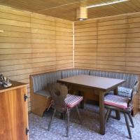 Ferienhaus mit Hund: Zusätzliche Gartenhütte mit kleiner Außenküche und Weber Holzkohlegrill - Haus Tauplitz