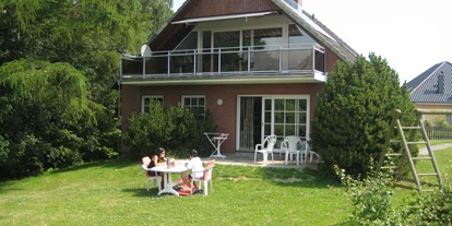 Hundehotel - Mikrowelle - Grömitz - Ferienhaus Wiesenblick Gartenansicht - Ferienhaus Wiesenblick