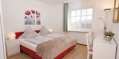 Hundehotel - Mikrowelle - Grömitz - Schlafzimmer EG - Ferienhaus Wiesenblick