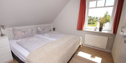Hundehotel - Mikrowelle - Grömitz - OG Schlafzimmer 1 - Ferienwohnung Krähenberg