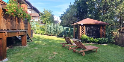 Hundehotel - Unterkunftsart: Einzelhaus - Garten mit Pavillon  - Ferienhaus Harmonie