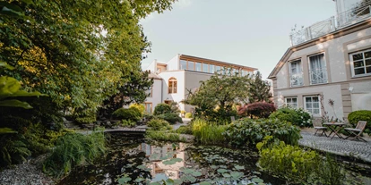 Hundehotel - Pools: Schwimmteich - Das Garten-Hotel Ochensberger ist eine echte grüne Oase mitten in der Oststeiermark - üppige  Natur und viel Freiraum auf über 7500m² versprechen eine naturnahe Auszeit - Garten-Hotel Ochensberger